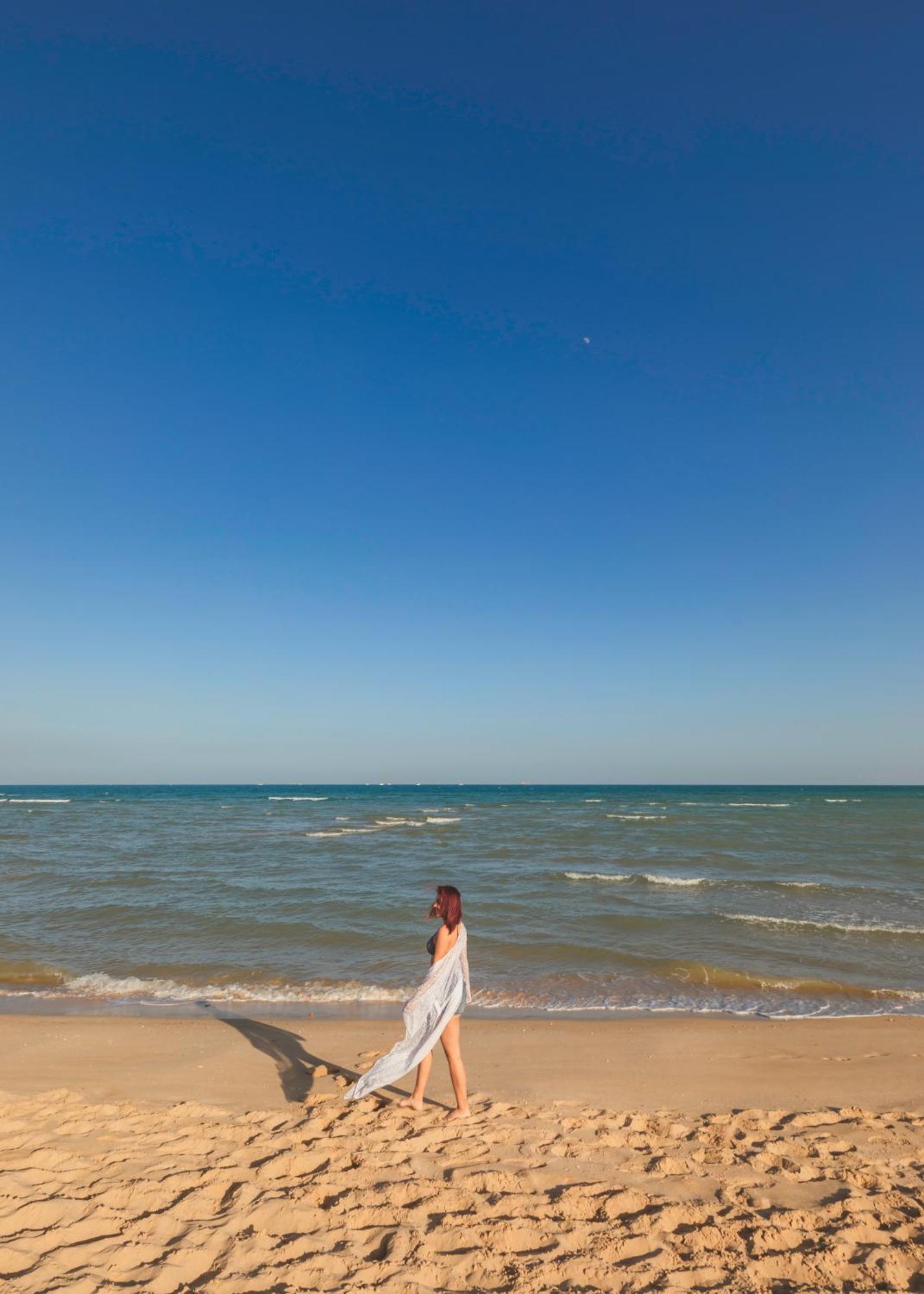 עיין סוחנה Stella Di Mare Grand Hotel מראה חיצוני תמונה The beach at Lake Michigan